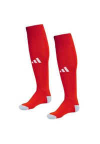 Getry piłkarskie Adidas Milano 23. Kolor: czerwony. Materiał: poliester, poliamid, elastan. Sport: piłka nożna