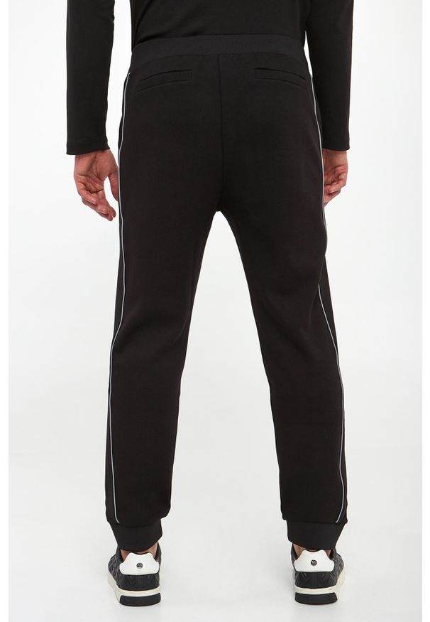 Spodnie dresowe męskie Tjanko JOOP!. Materiał: dresówka