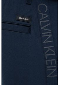 Calvin Klein Spodnie męskie kolor granatowy z nadrukiem. Kolor: niebieski. Wzór: nadruk #3