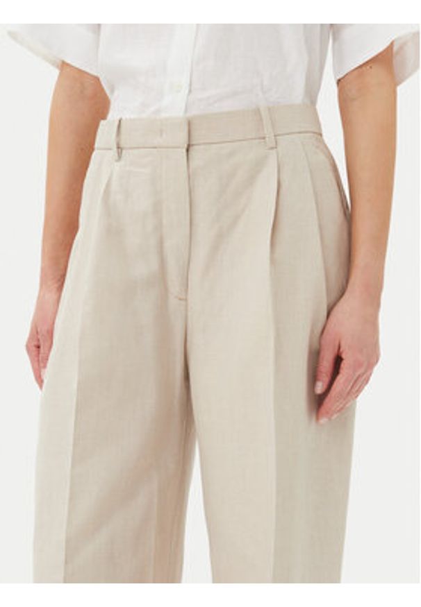 TOMMY HILFIGER - Tommy Hilfiger Spodnie materiałowe WW0WW45460 Beżowy Relaxed Fit. Kolor: beżowy. Materiał: len