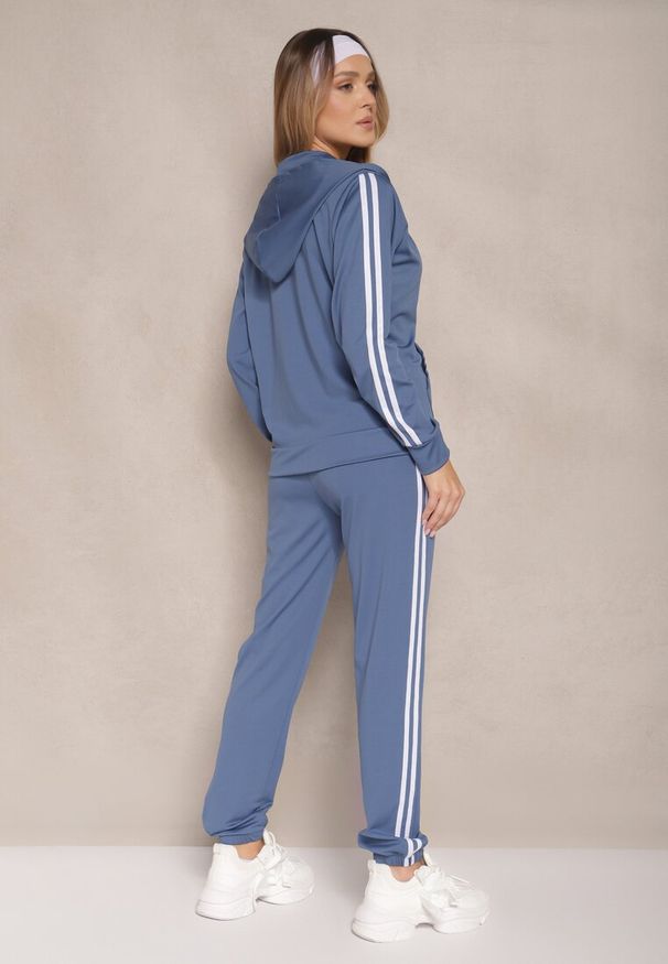 Renee - Niebieski Komplet Dresowy Rozpinana Bluza z Kapturem i Spodnie Osivisa. Kolor: niebieski. Materiał: dresówka. Wzór: aplikacja. Sport: turystyka piesza