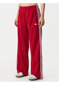 Adidas - adidas Spodnie dresowe Pinstripe Firebird Loose Trackpant KS9977 Czerwony Wide Leg. Kolor: czerwony. Materiał: syntetyk #1