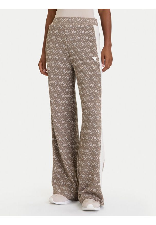 Guess Spodnie dresowe V5BB15 K1990 Brązowy Relaxed Fit. Kolor: brązowy. Materiał: syntetyk