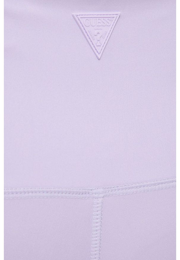 Guess - Legginsy. Kolor: fioletowy. Materiał: skóra, dzianina. Wzór: nadruk