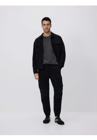 Reserved - Spodnie jogger cargo - czarny. Kolor: czarny. Materiał: tkanina, bawełna