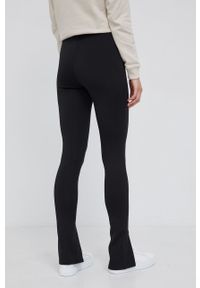 Calvin Klein Spodnie damskie kolor czarny gładkie. Kolor: czarny. Materiał: poliester. Wzór: gładki #4