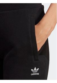 Adidas - adidas Spodnie dresowe adicolor Essentials IA6479 Czarny Slim Fit. Kolor: czarny. Materiał: bawełna