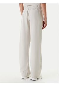 Adidas - adidas Spodnie dresowe Essentials Small Logo Feel Cozy JC5922 Beżowy Regular Fit. Kolor: beżowy. Materiał: syntetyk, bawełna #5