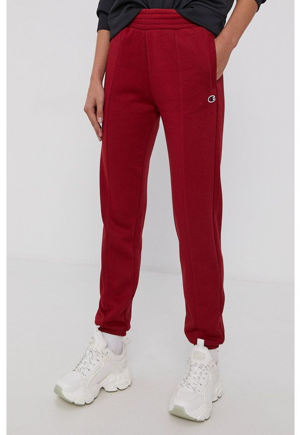 Champion Spodnie 114470 damskie kolor bordowy gładkie. Kolor: czerwony. Materiał: bawełna, dzianina. Wzór: gładki