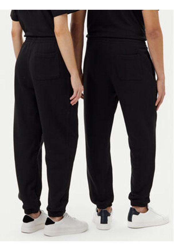 Lacoste Spodnie dresowe XH2750 Czarny Regular Fit. Kolor: czarny. Materiał: bawełna