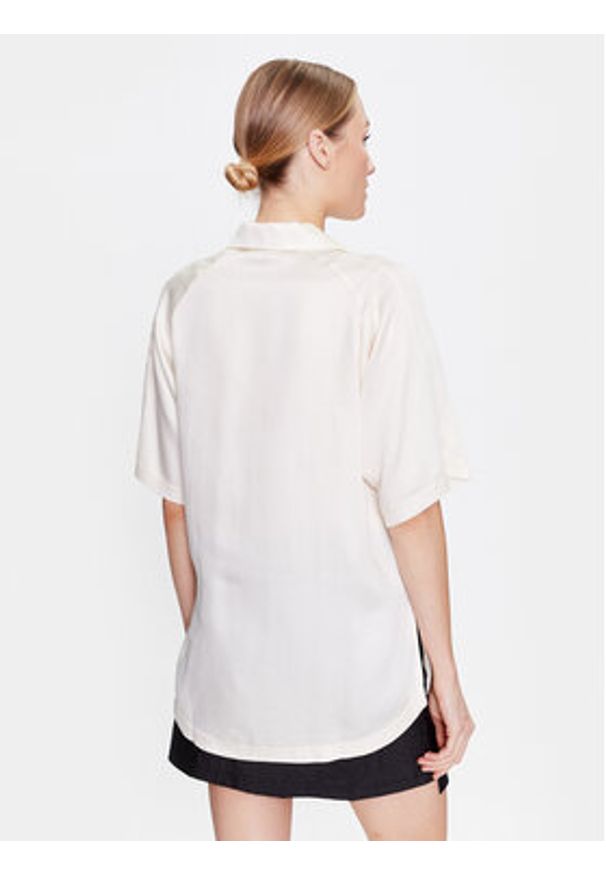 Puma Bluzka T7 538283 Écru Relaxed Fit. Materiał: lyocell