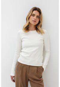 BLUZKA SUZANE ECRU L - Flawless. Okazja: do pracy, na spotkanie biznesowe. Materiał: prążkowany, dresówka, dzianina. Długość rękawa: długi rękaw. Styl: biznesowy, klasyczny #1