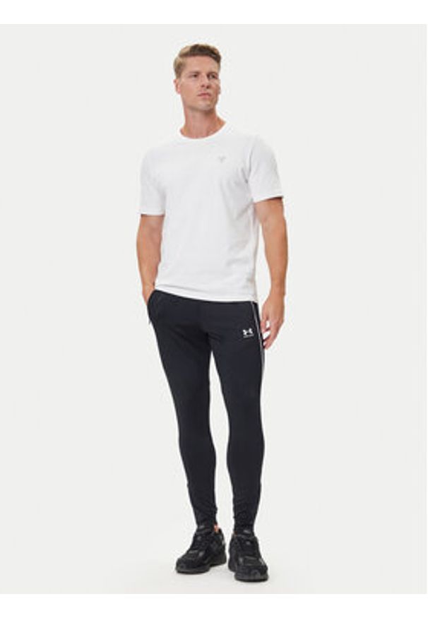 Under Armour Spodnie dresowe Challenger Training 6004044 Czarny Slim Fit. Kolor: czarny. Materiał: dresówka