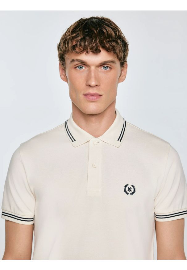 Big-Star - Koszulka męska polo kremowa Poller 103. Typ kołnierza: polo. Kolor: biały. Materiał: dzianina, jeans. Wzór: haft. Styl: elegancki