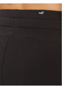 Puma Spodnie dresowe Her 676007 Czarny Relaxed Fit. Kolor: czarny. Materiał: bawełna