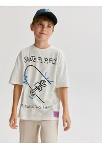 Reserved - T-shirt z nadrukiem - złamana biel. Materiał: bawełna, dzianina. Wzór: nadruk