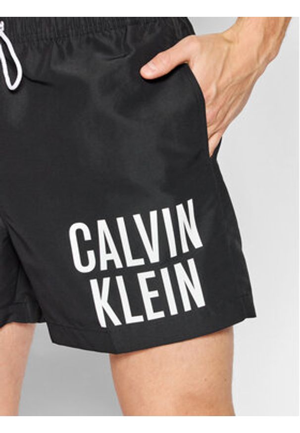 Calvin Klein Swimwear Szorty kąpielowe Medium KM0KM00739 Czarny Regular Fit. Kolor: czarny. Materiał: syntetyk