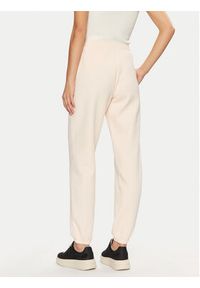 Guess Spodnie dresowe V5RB02 KCLD1 Écru Regular Fit. Materiał: bawełna, syntetyk