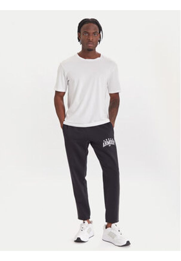 Under Armour Spodnie dresowe Ua Rival Fleece Colorblock 6003954 Czarny Loose Fit. Kolor: czarny. Materiał: bawełna