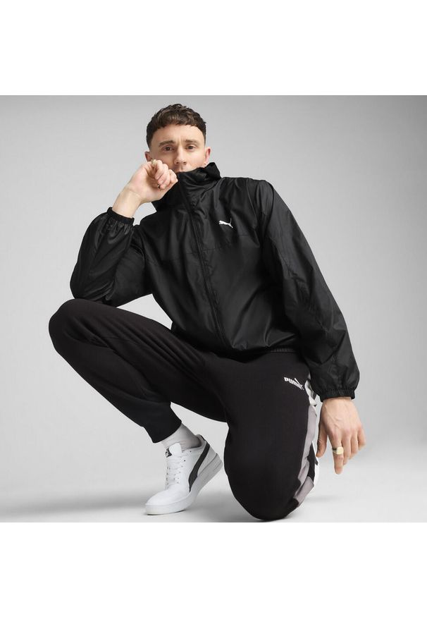 Puma - Męska Wiatrówka o standardowym kroju Essentials PUMA. Kolor: czarny. Materiał: guma. Wzór: nadruk. Sport: bieganie