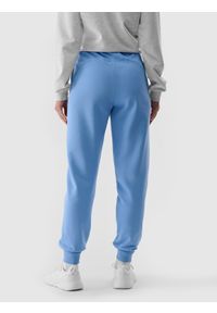 4f - Spodnie dresowe joggery damskie - niebieskie. Kolor: niebieski. Materiał: dresówka. Wzór: gładki, ze splotem