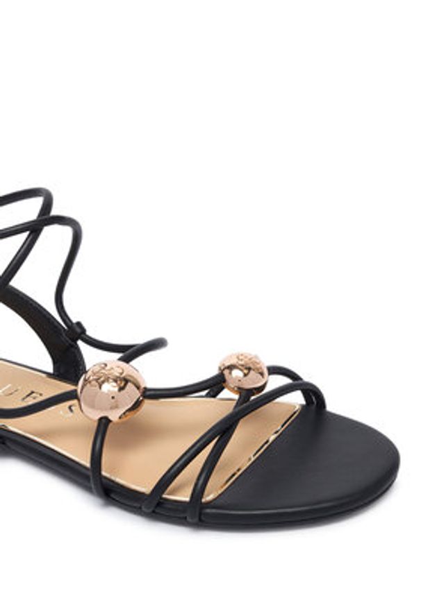 Guess Sandały FLTTAB ELE03 Czarny. Kolor: czarny. Materiał: skóra