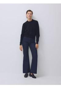 Reserved - Sweter z wełny merino - czarny. Kolor: czarny. Materiał: wełna