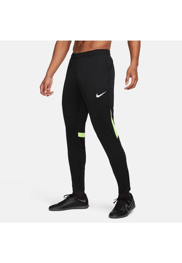 Spodnie sportowe męskie Nike Dri-FIT Academy Pro Pants. Kolor: czarny, żółty, wielokolorowy. Materiał: poliester. Technologia: Dri-Fit (Nike). Sport: piłka nożna