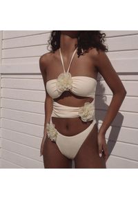 Intica - Strój kąpielowy z kwiatowym wzorem Octaviana. Kolor: beżowy. Materiał: tkanina. Wzór: kwiaty