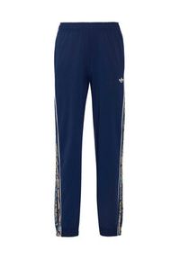 Adidas - adidas Spodnie dresowe Sst KR9187 Granatowy Loose Fit. Kolor: niebieski. Materiał: syntetyk #4