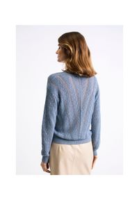 Ochnik - Niebieski ażurowy sweter damski. Okazja: na co dzień. Kolor: niebieski. Długość: długie. Wzór: ażurowy. Styl: casual