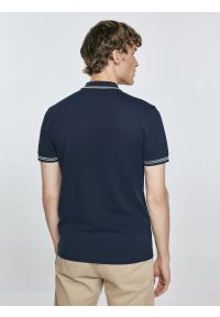 Big-Star - Koszulka męska polo granatowa Poller 403. Okazja: na co dzień. Typ kołnierza: polo. Kolor: niebieski. Materiał: jeans, materiał, dzianina. Wzór: ze splotem, haft, aplikacja. Styl: sportowy, casual