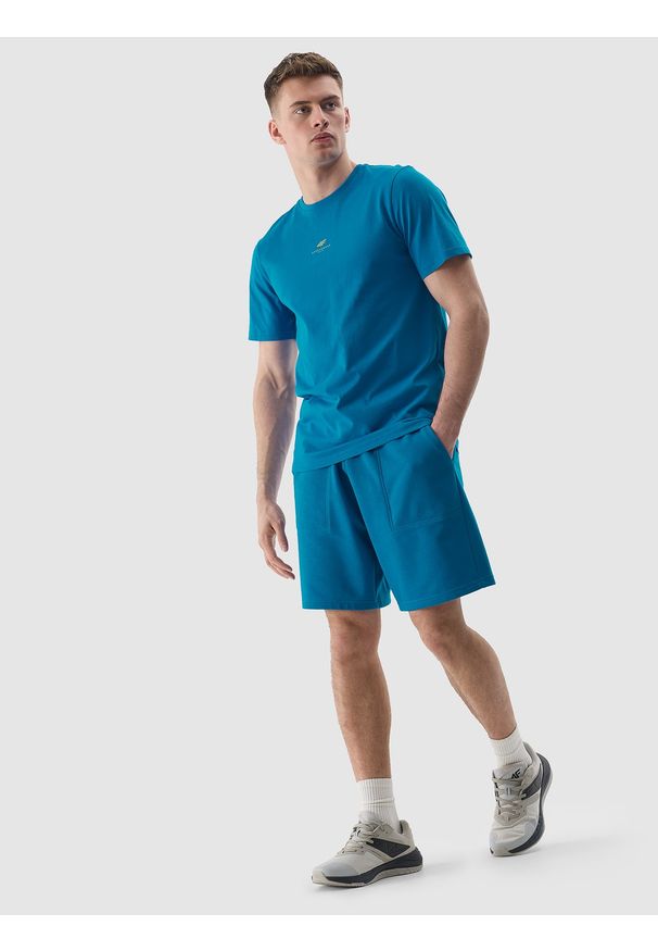 4f - 4F Spodenki dresowe męskie - niebieskie M. Kolor: niebieski. Materiał: dresówka. Długość: krótkie. Wzór: gładki, nadruk, ze splotem