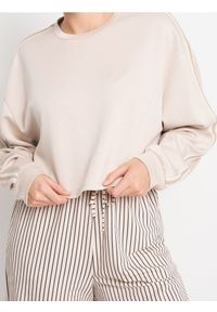 Sinsay - Bluza z dekoracyjnymi lampasami soft touch - beżowy. Kolor: beżowy. Materiał: dzianina, wiskoza
