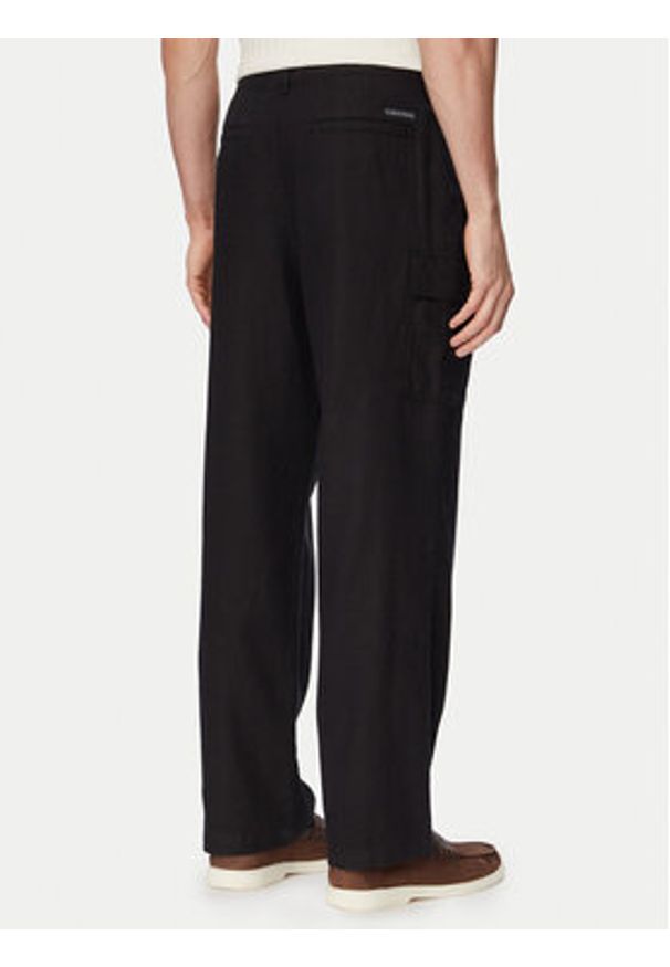 Calvin Klein Jeans Spodnie cargo LV04RF611G Czarny Relaxed Fit. Kolor: czarny. Materiał: bawełna, len