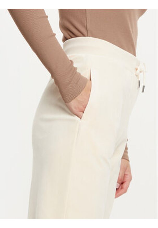 Guess Spodnie dresowe V3BB26 KBXI2 Écru Regular Fit. Materiał: syntetyk