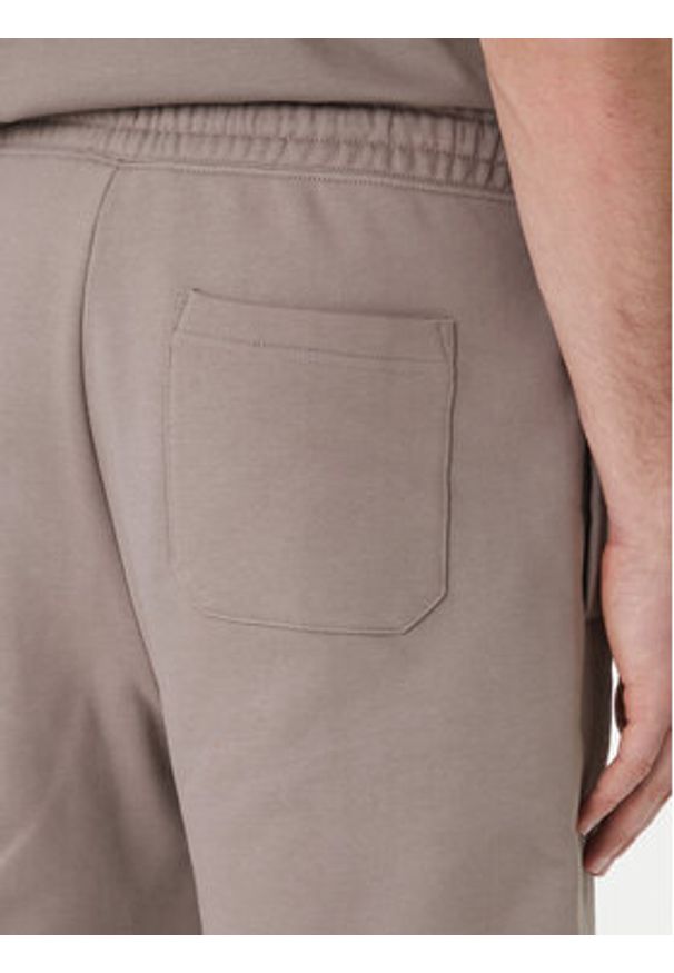 Hugo - HUGO Szorty sportowe Dinkoe 50535260 Beżowy Relaxed Fit. Kolor: beżowy. Materiał: bawełna. Styl: sportowy