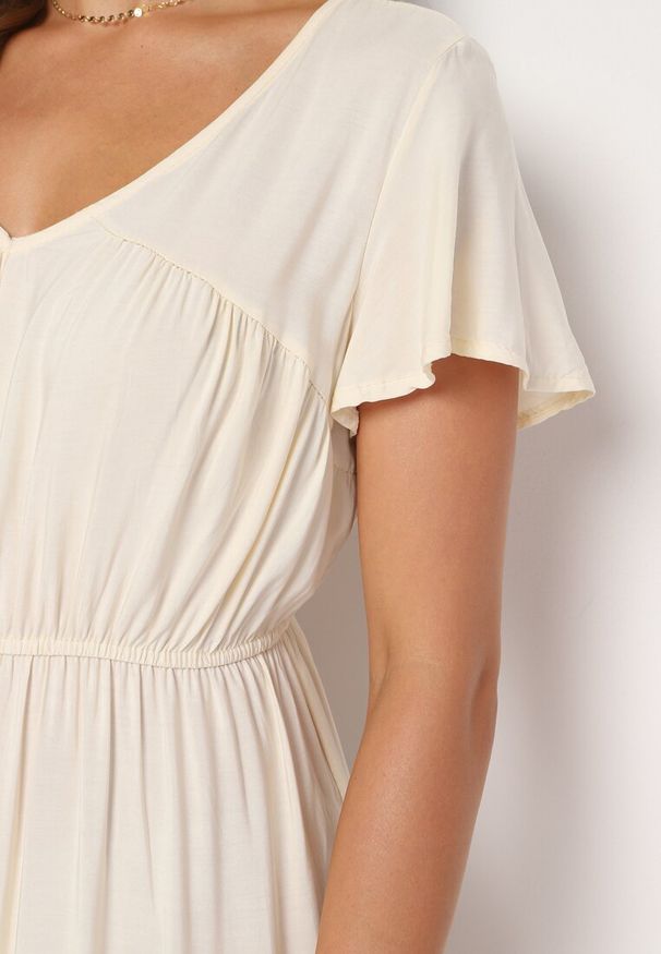 Born2be - Jasnobeżowa Sukienka z Wiskozy o Rozkloszowanym Kroju Folky. Okazja: na co dzień. Typ kołnierza: dekolt w kształcie V. Kolor: beżowy. Materiał: wiskoza. Styl: elegancki, casual