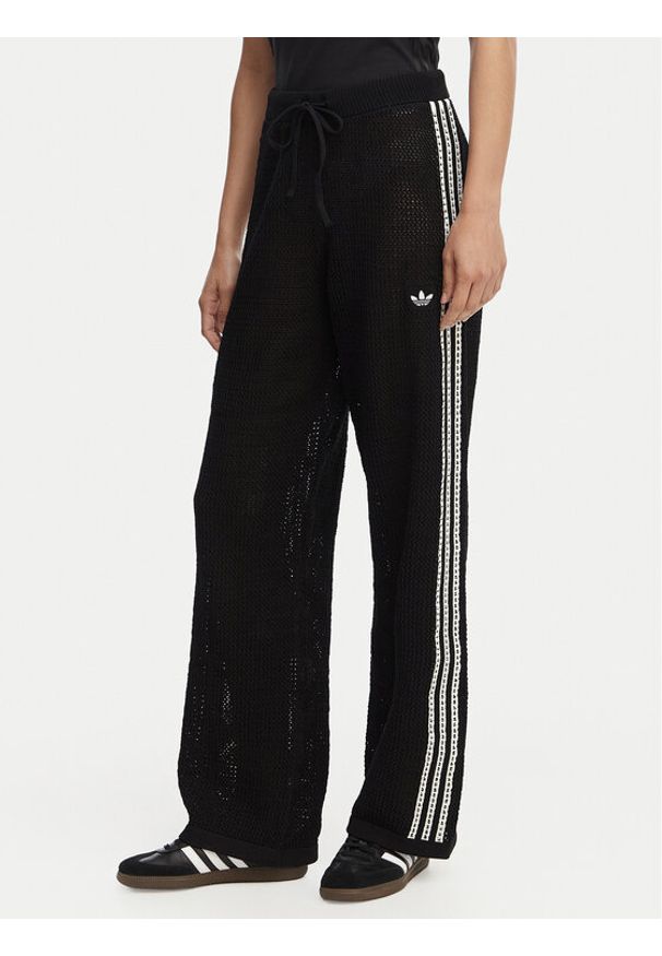 Adidas - adidas Spodnie dzianinowe Knitted Crochet Firebird KC6494 Czarny Regular Fit. Kolor: czarny. Materiał: syntetyk