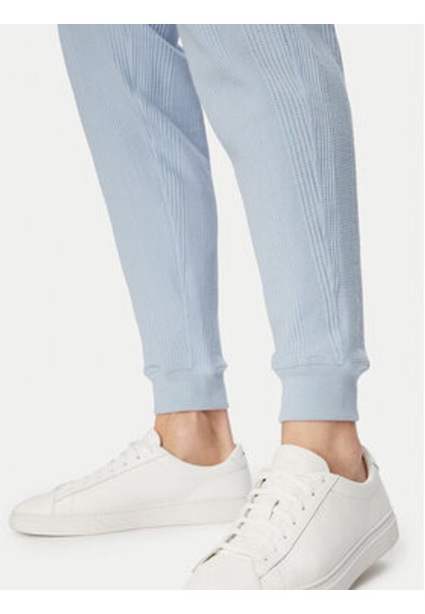 BOSS Spodnie dresowe Structure 50540577 Niebieski jasny Regular Fit. Kolor: niebieski. Materiał: syntetyk