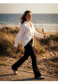 Sinsay - Spodnie flare - czarny. Kolor: czarny #1