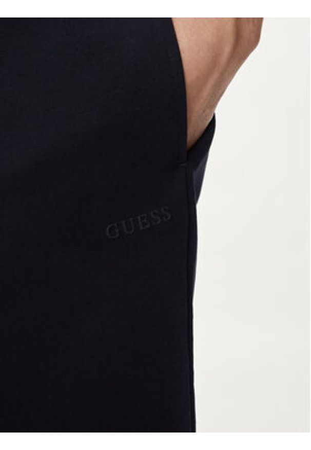 Guess Szorty materiałowe Clovis M4GD10 KBK32 Granatowy Loose Fit. Kolor: niebieski. Materiał: bawełna, syntetyk