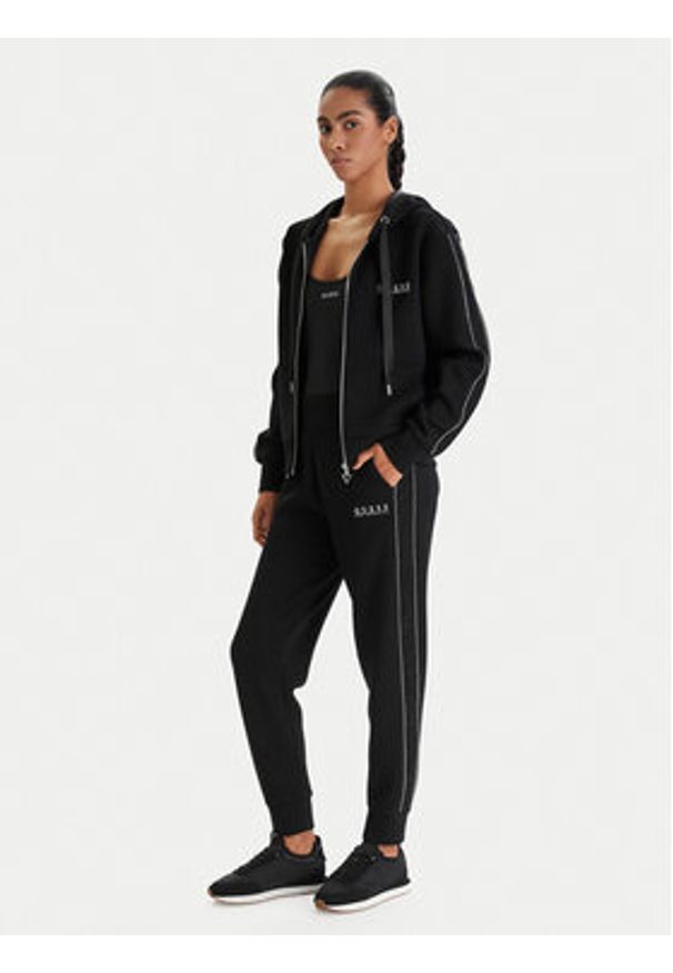 Guess Spodnie dresowe W6RB45 KBYE2 Czarny Regular Fit. Kolor: czarny. Materiał: syntetyk