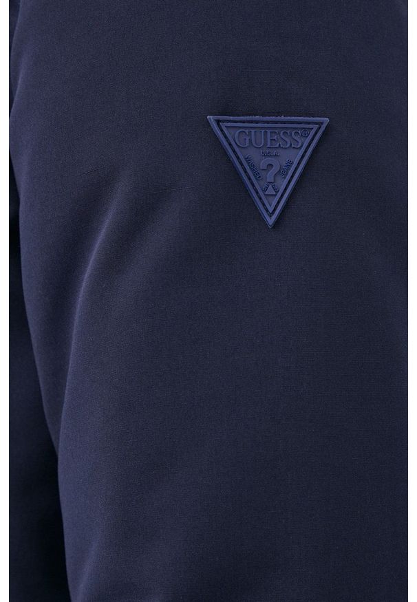 Guess - Kurtka puchowa. Okazja: na co dzień. Kolor: niebieski. Materiał: puch. Wzór: gładki. Styl: casual