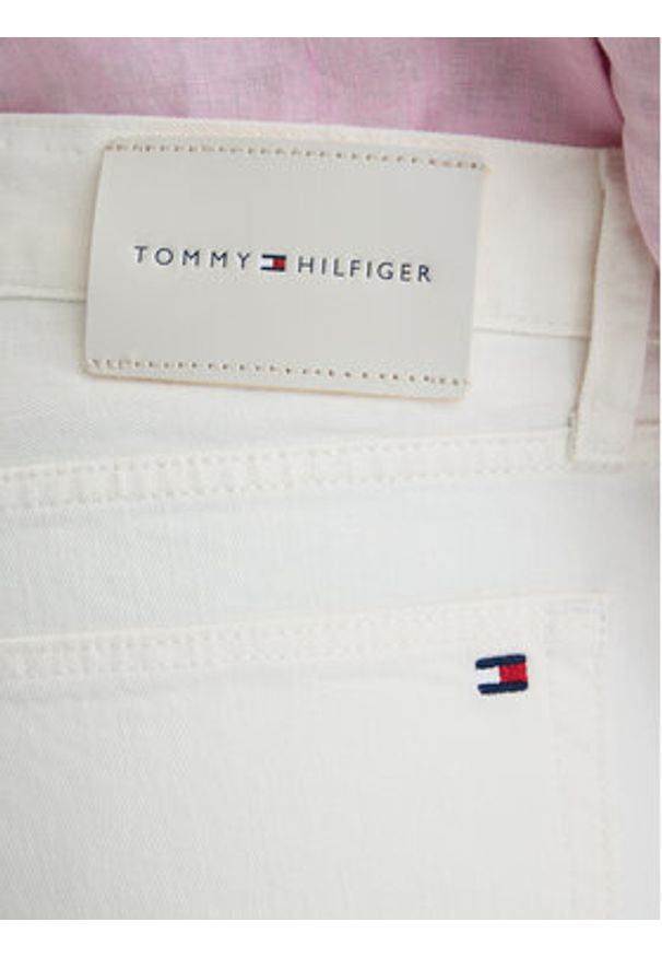 TOMMY HILFIGER - Tommy Hilfiger Jeansy MW0MW42895 Biały Slim Fit. Kolor: biały