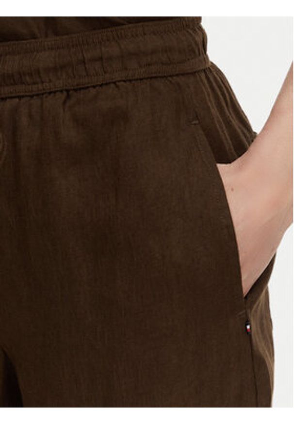 TOMMY HILFIGER - Tommy Hilfiger Spodnie materiałowe WW0WW48970 Brązowy ciemny Wide Leg. Kolor: brązowy. Materiał: len