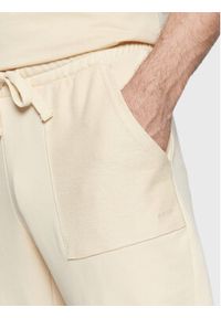 outhorn - Outhorn Spodnie dresowe TTROM036 Écru Regular Fit. Materiał: dresówka, bawełna