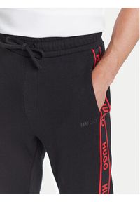 Hugo - HUGO Spodnie dresowe Liam 50540918 Czarny Regular Fit. Kolor: czarny. Materiał: bawełna #3