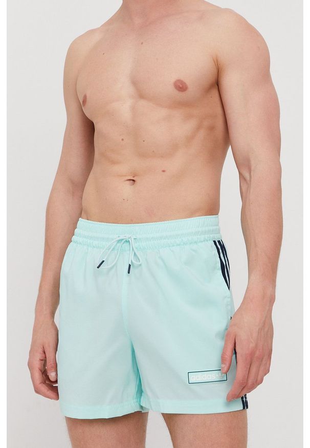 adidas Originals Szorty kąpielowe kolor turkusowy. Kolor: turkusowy. Materiał: poliester. Wzór: aplikacja