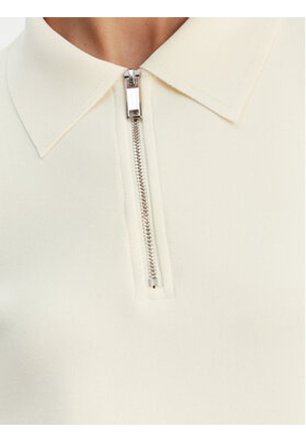 Calvin Klein Polo LV044E241G Beżowy Relaxed Fit. Typ kołnierza: polo. Kolor: beżowy. Materiał: syntetyk